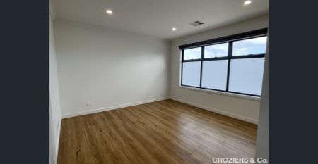 Elegant Family Home with Modern Amenities - Photo 2