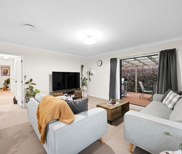 Modern and low-maintenance, this 3-bedroom, 1-bathroom home with a ... - Photo 1