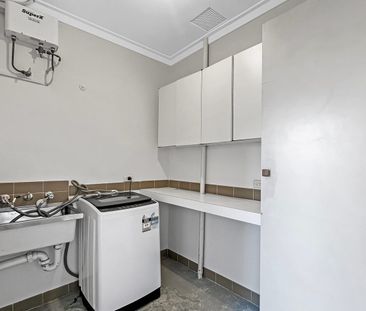 Charming Home with Comfort & Included Garden Care - Photo 6