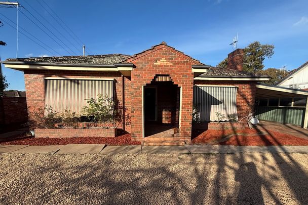 CENTRALLY LOCATED LOW MAINTENANCE HOME - Photo 1