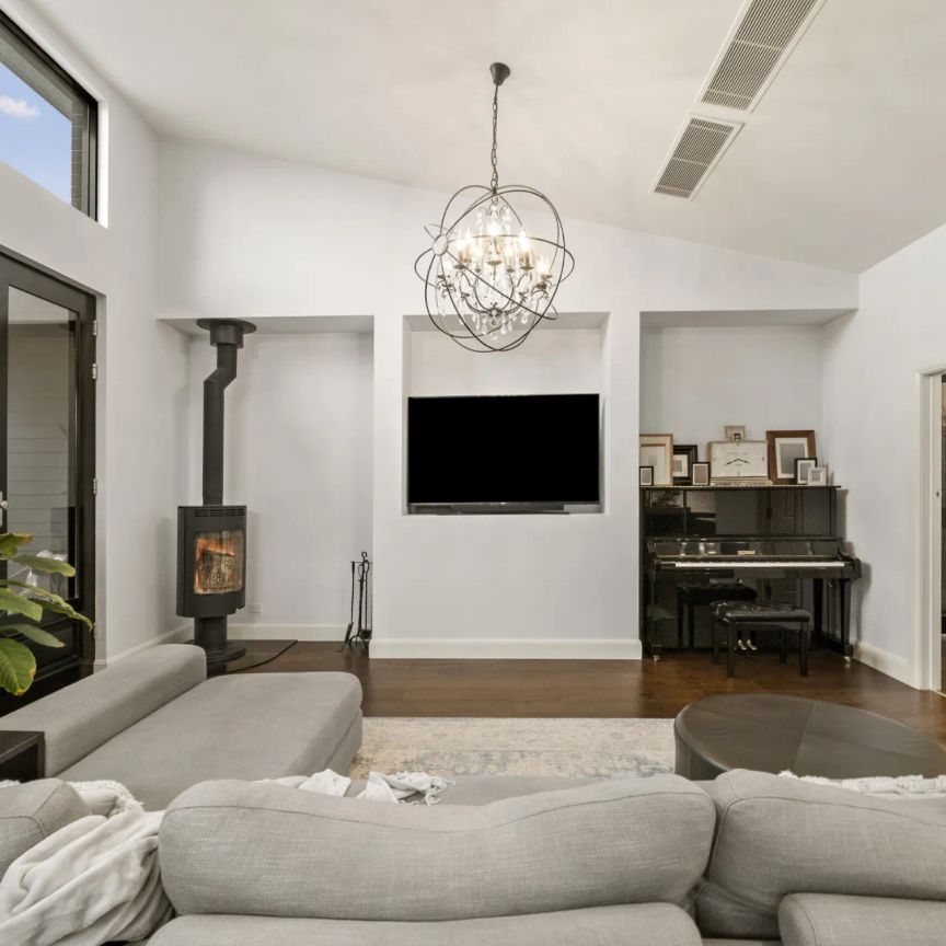 Luxury Tudor Residence with Modern Elegance and Family Appeal - Photo 1