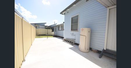 Large 4-Bedroom Home - Photo 4