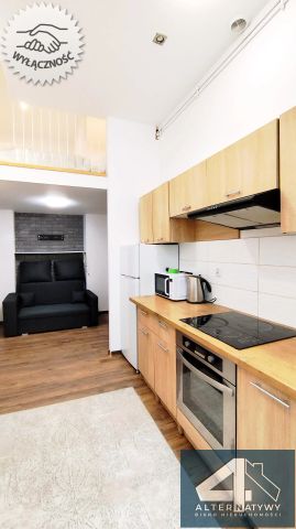 Kawalerka z antresolą przy Manufakturze - Фото 3