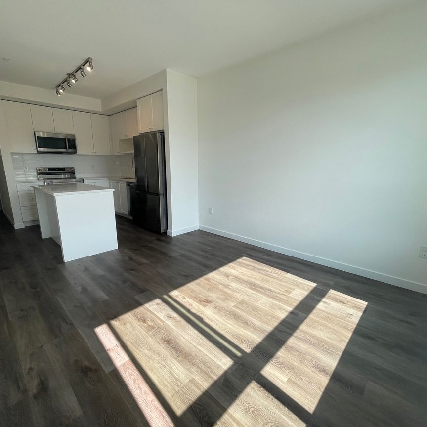 Unit B114 - Beautifully Designed/ Two Bedrooms Plus Den at The Grove - Photo 1
