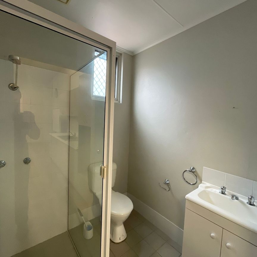 Modern 2-Bedroom Flat in the Heart of the CBD – Utilities Included! - Photo 1