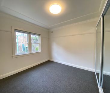 Renovated 2-Bedroom + Sunroom Apartment in Prime Location - Photo 1