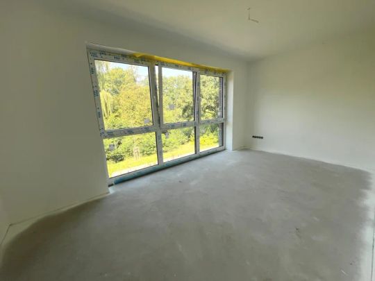 **hochwertige Neubau-Mietwohnung mit 2 Zimmern und Stellplatz im 1.OG in Rheine-Eschendorf** - Foto 1