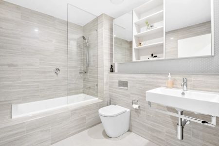 Immaculate & Modern Apartment in Sought After Block - Photo 2