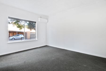 Cosy and Well-Maintained Two Bedroom Unit - Photo 2