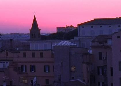 Attic-Monti: 1-6 month rentals. Spacious, furnished 3 Bedroom, 2 bath, living room, dining room, study and large panoramic terrace. Bright, silent, located in well kept Palazzo d’Epoca with elevator and doorman. Near transport and Metro.