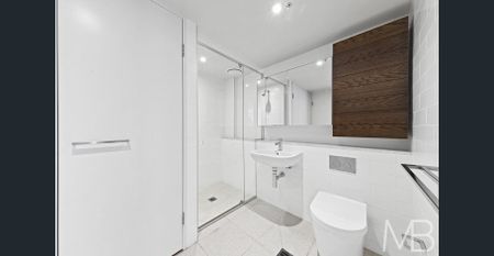 EXECUTIVE LIVING WITH STUDY & PANORAMIC WATERFRONT VIEWS - Photo 4