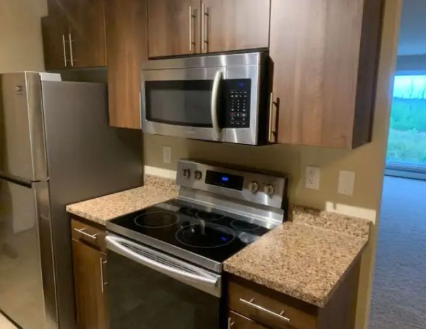 REDUCED OFFER - Two bedroom rebuilt condominium in Abasand starting at $1399 | 1124 - 201 Abasand Drive, Fort McMurray - Photo 1