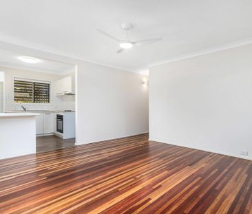 Spacious Three-Bedroom Unit in Convenient Location - Photo 6
