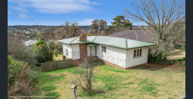 WHAT A PLEASANT SURPRISE THIS HOME IS! - Photo 1