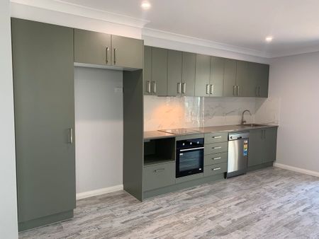 Near-new unit offering low-maintenance living - Photo 4