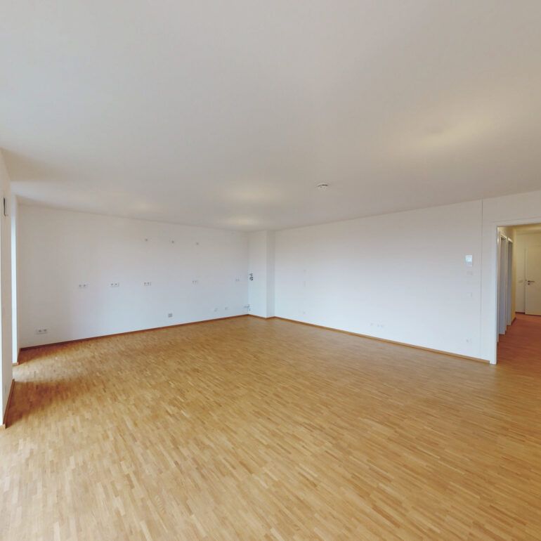 Ein Neubau für das Leben im Quartier mit großzügigem Wohnbereich und Balkon - Photo 1