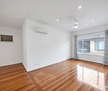 Open the Door to Light-Filled Living with a Private Courtyard Retreat - Photo 3