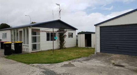 Renovated 2 Bedroom Unit with shared garage - Photo 3