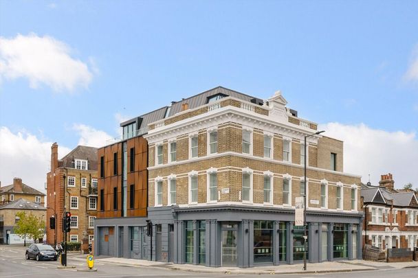 A stylish, brand new 2 bedroom penthouse apartment located moments away from the River Thames. - Photo 1