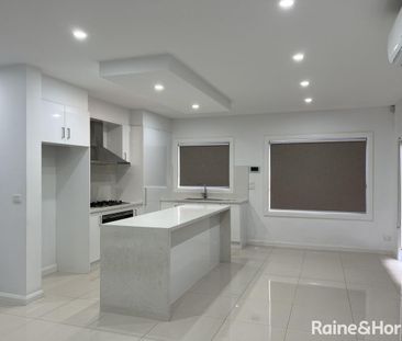 Modern Living in a Thriving Location! - Photo 4