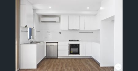 STYLISH NORTH FACING APARTMENT IN A BOUTIQUE BLOCK - Photo 3