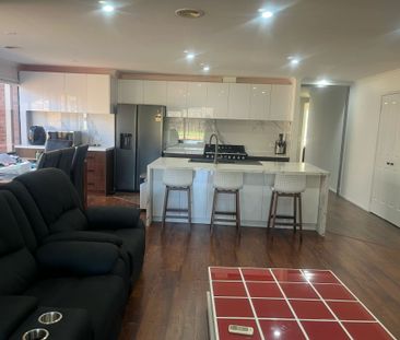 Expansive 4-Bedroom Home Designed for Family Living! - Photo 5