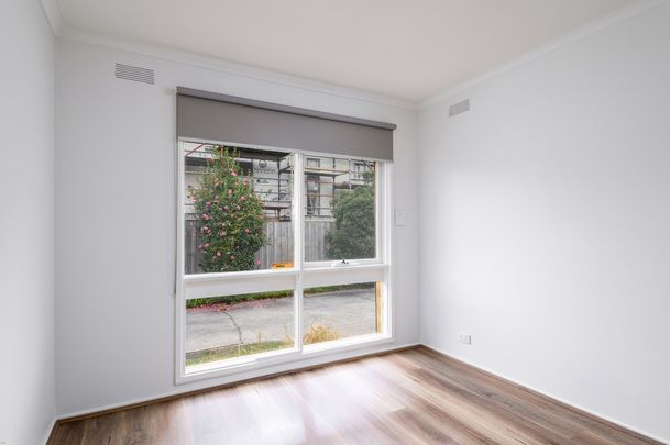 TWO BEDROOM SPACIOUS UNIT WITH DOUBLE GARAGE - Photo 1
