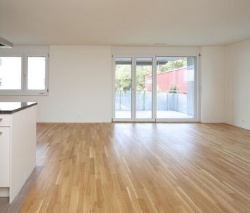 Helle Wohnung mit gemütlichem Gartensitzplatz - Foto 1