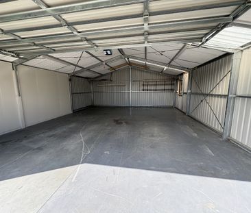 4 Bedrooms + Huge Garage + Pet Friendly! - Photo 3