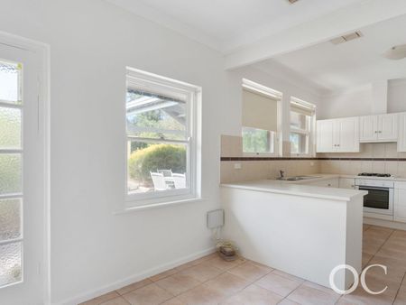 Open the Door to Spacious Family Home with Studio – Central Victor Location - Photo 4