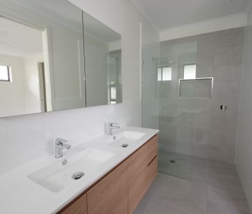 Set in the exclusive "Korora Beach Estate", this home ticks all the... - Photo 4