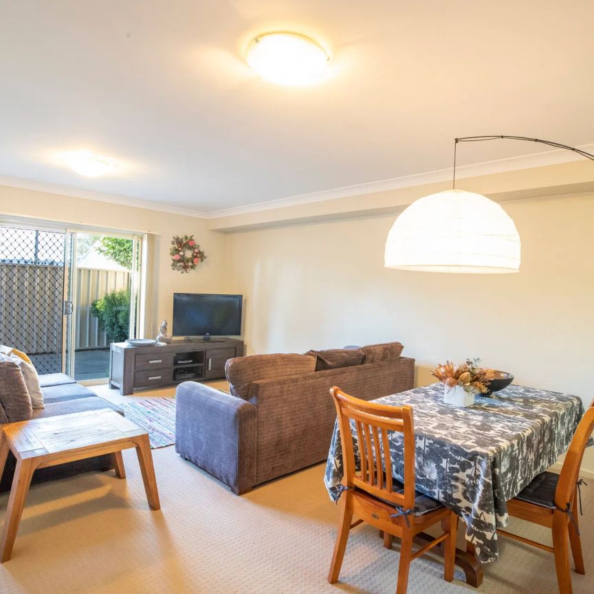 Modern Townhouse Living With Rare Second Car Space - Photo 1