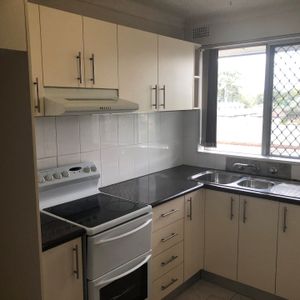 Perfectly Positioned 2-Bedroom Unit - Photo 2
