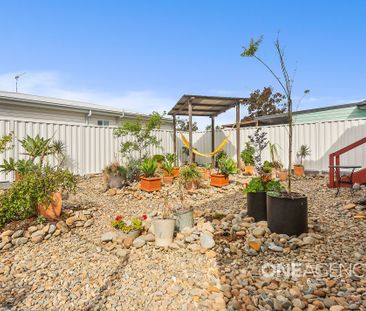 WARM AND WELCOMING FOUR-BEDROOM HOME - Photo 3