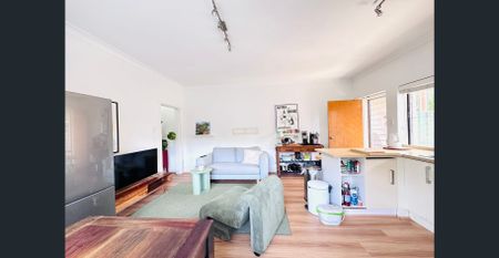 Partially Furnished Semi-Style Apartment with Private Courtyard - Photo 5