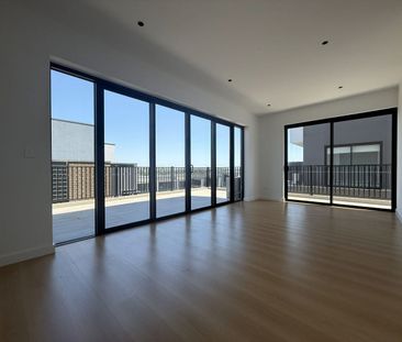 Spacious Three-Level Townhouse with Workshop & Dual Outdoor Living - Photo 1