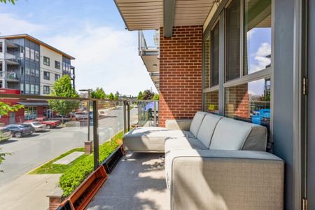 Bright Corner Condo with 2 Parking - Photo 2