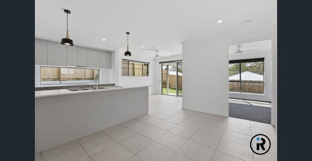 Beautiful Brand-New 4-Bedroom Home in a Prime Brassall Location - Photo 1