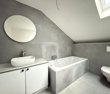 Erstvermietung nach Kernsanierung – stylish 3.5-room penthouse apar... - Photo 4