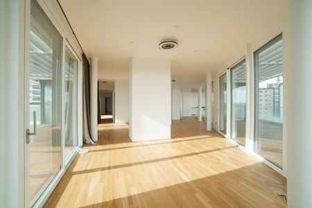 Lichtdurchflutete Dachgeschosswohnung mit beeindruckendem Panoramablick auf die Donauinsel - Photo 3