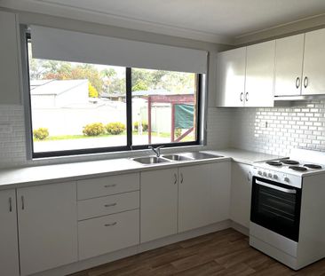 CONVENIENTLY LOCATED FAMILY HOME - Photo 1