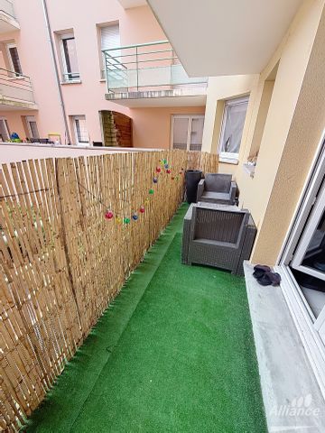 Coquet appartement T2 de 43 m2 avec balcon et place de parking en sous sol à Belfort centre - Photo 2