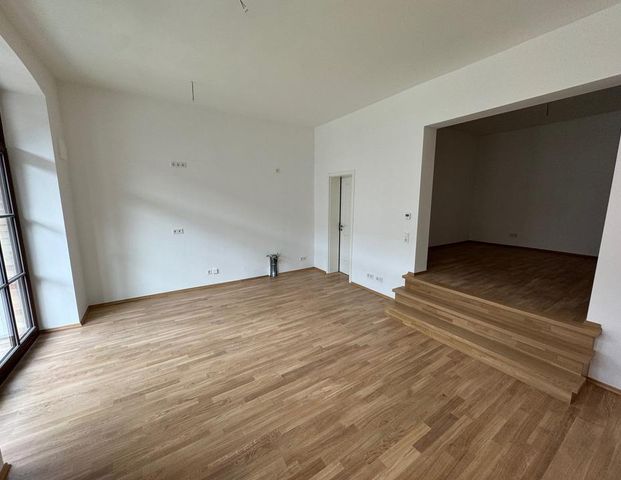 1-Raum-Wohnung mit Wohn-Essküche und Treppe zum Schlafbereich- WE21 - Photo 1