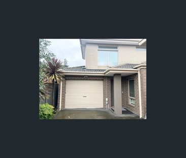 Stylish, Low-Maintenance Living in a Prime Location - Photo 1