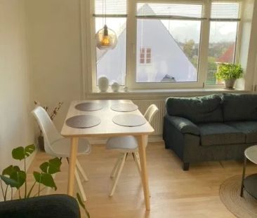 Lys lejlighed med moderne indretning i byen - Photo 1