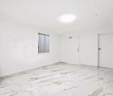 Modern Four Bedroom In a Convenient Location! - Photo 6