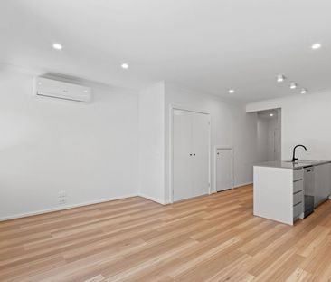 Stylish Two-Level Townhouse with Modern Comfort & Flexibility - Photo 3