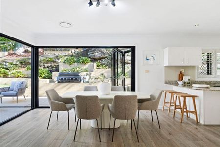 LIGHT-FILLED FAMILY RETREAT OFFERING SPACE AND CONVENIENCE - Photo 3