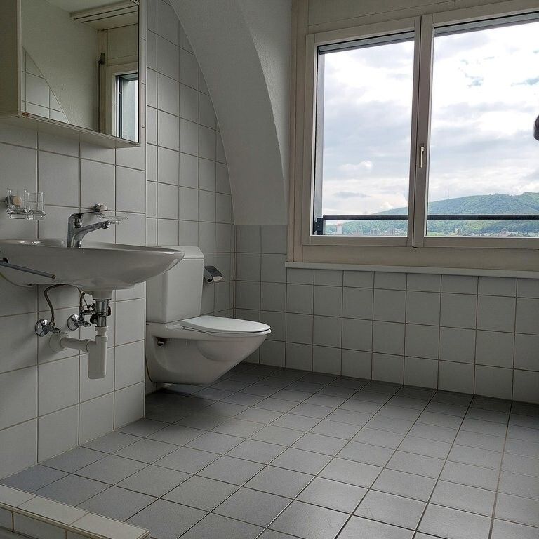 Ein glücklicher Wohnungsstart über den Dächern - Foto 1