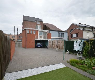 Verzorgde halfopen woning met drie slaapkamers en tuin - Photo 6